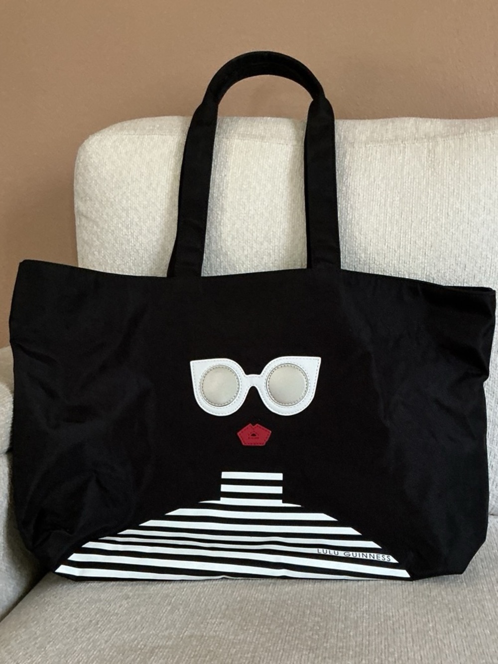 Lulu Guinness Black Tote with White Sunglasses and Red Lip Graphic